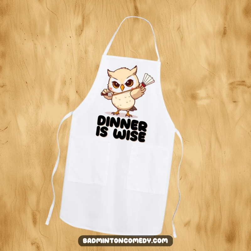 Funny Owl Badminton Apron: A focused owl character preparing to hit a shuttlecock, humorously depicted while cooking.