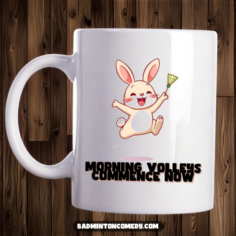 Funny mug: A cartoon rabbit joyfully leaps mid-air, hitting a badminton shuttlecock with its racket, conveying pure athletic fun.