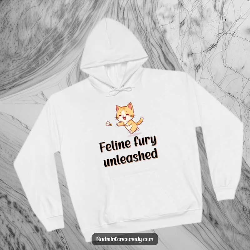 Funny Cat Badminton Hoodie: A joyful cat character energetically chases a shuttlecock across a badminton court with feline grace.