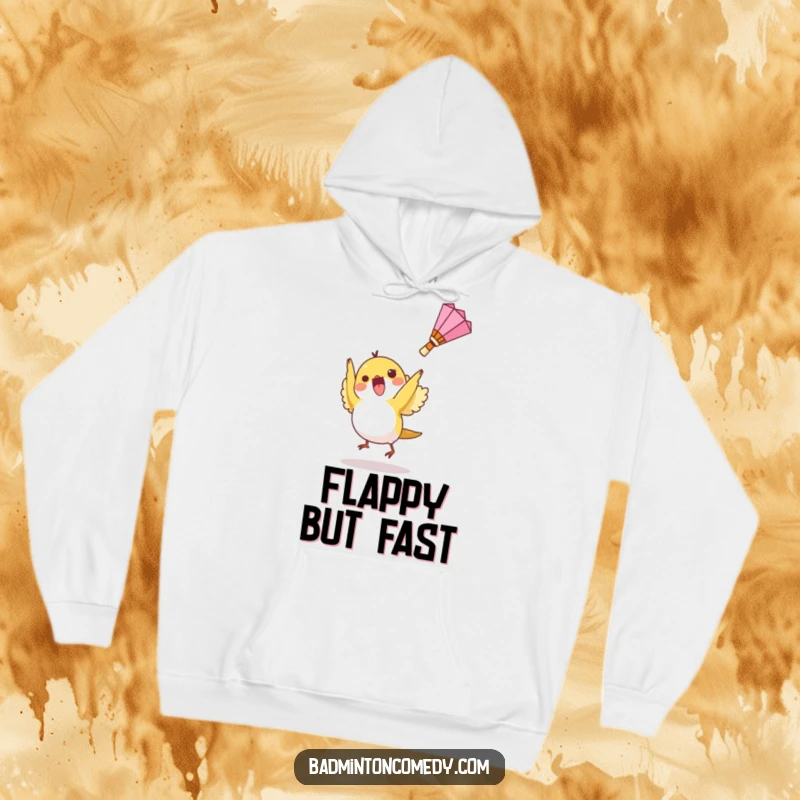 Funny hoodie showing a small bird character excitedly launching a shuttlecock upwards, perfect for badminton fans.