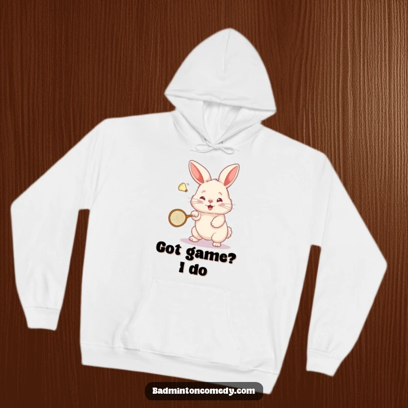 Funny Bunny Badminton Hoodie: A small, fluffy bunny plays badminton, powerfully hitting a shuttlecock with a tiny racket.