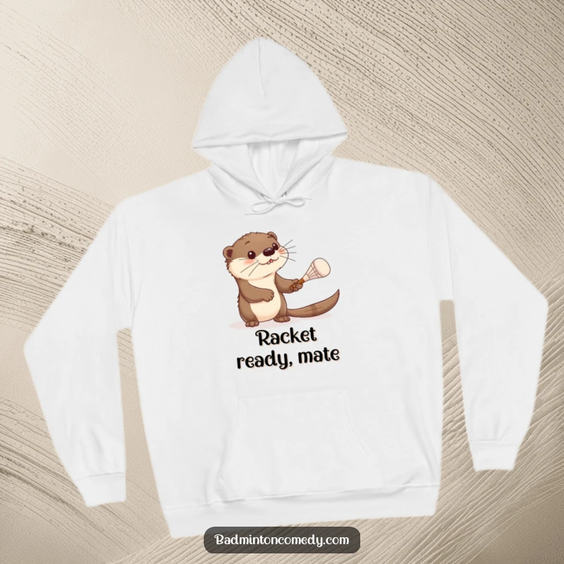 Funny otter hoodie, a curious otter batting a shuttlecock with a tiny racket, embodying playful and humorous engagement with the game.