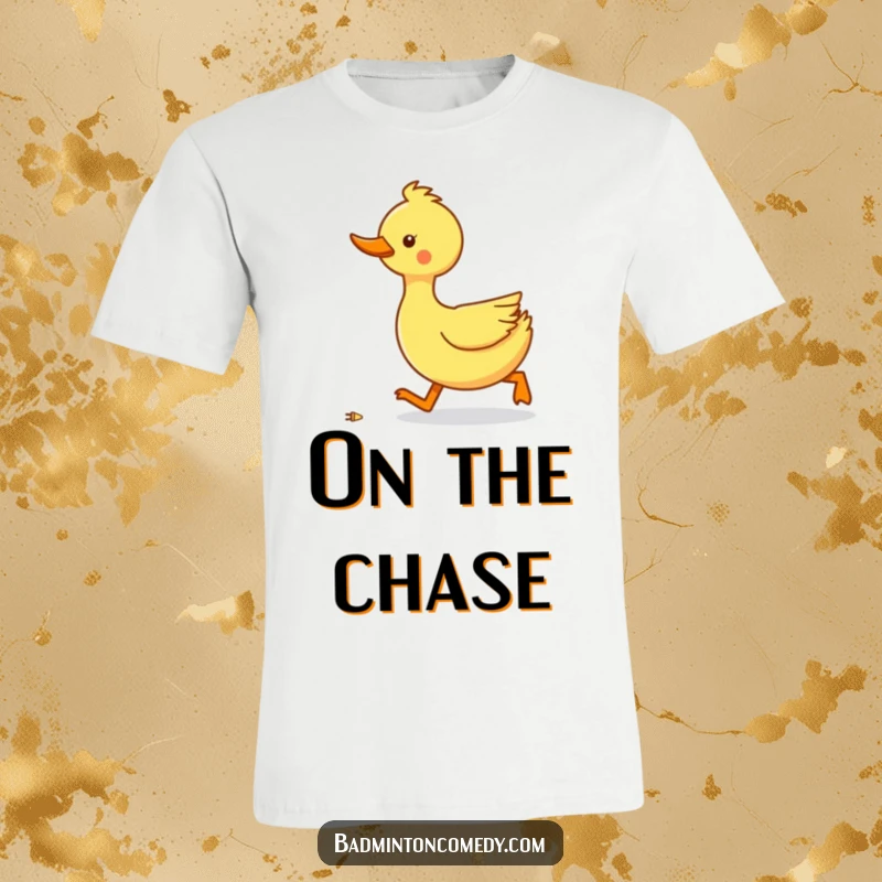 Funny duck waddling quickly to catch a shuttlecock on a t-shirt, emphasizing speed and a humorous chase.