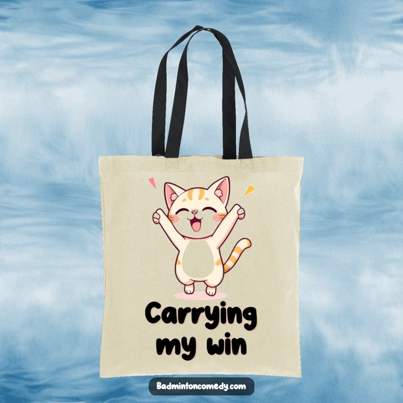 Funny tote bag depicting a small cat character performing an enthusiastic victory jump, ready to carry your items with feline energy.