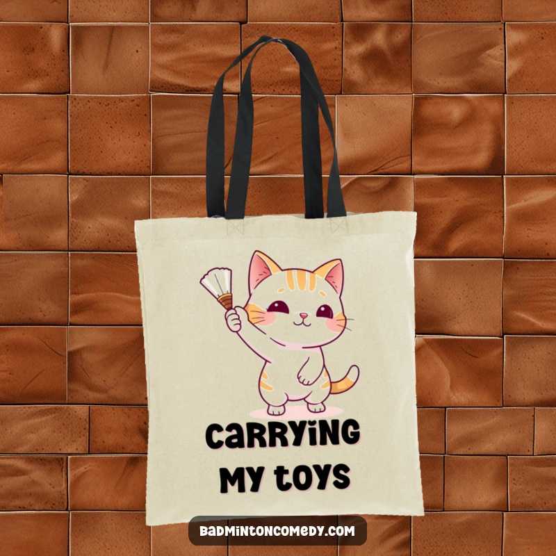 Funny Cat Badminton Tote Bag showing a playful cat batting a shuttlecock with its paw, perfect for stylish, humorous carrying.