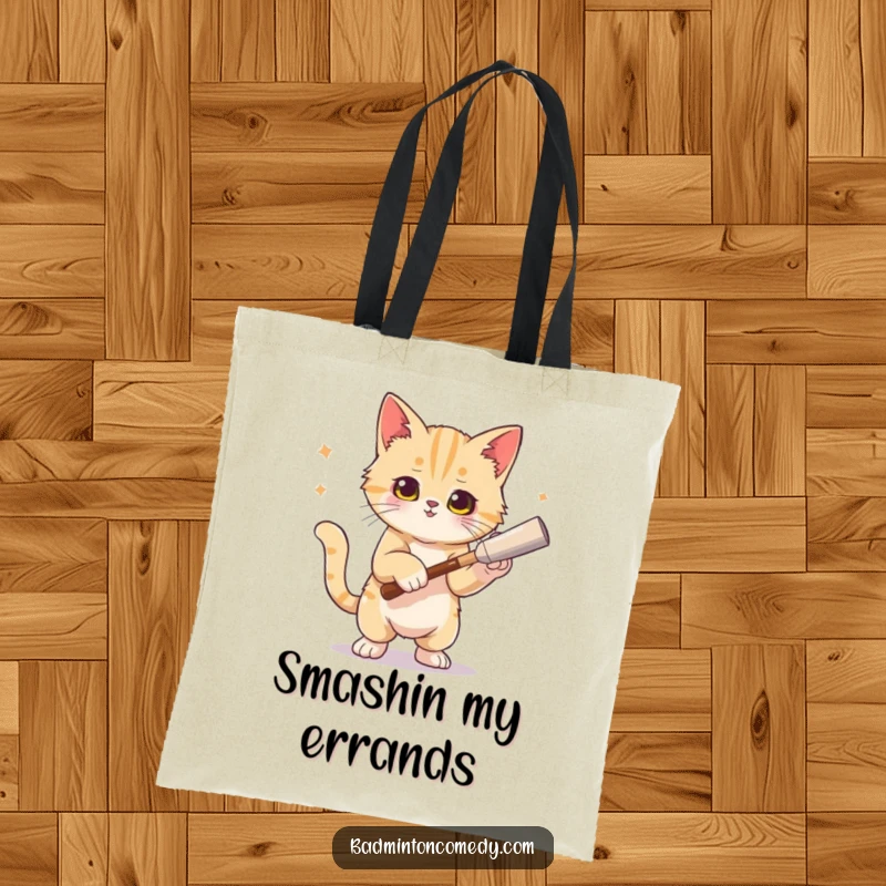 Funny cat tote bag showing a sophisticated cat posing victoriously after a tennis smash, exuding feline grace.